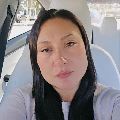 Smiling female teacher with glasses